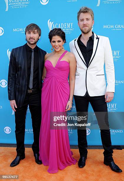 Musician Dave Haywood, singer Hillary Scott and singer Charles Kelley of Lady Antebellum arrive at the 45th Annual Academy Of Country Music Awards at...