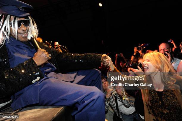 Actress Rosanna Arquette seen with musician Sly Stone during his performamce on day 3 of the Coachella Valley Music & Art Festival 2010 held at The...