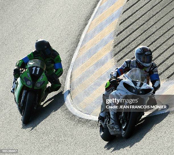 French Julien Da Costa rides his Kawasaki N°11 ahead of Slovenian Igor Jerman on his Yamaha N°1, during the 33rd edition of the Le Mans 24-Hour...