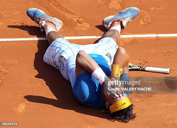 Spanish Rafael Nadal jubilates after winning against his compatriot Fernando Verdasco during the Monte-Carlo ATP Masters Series final tennis...