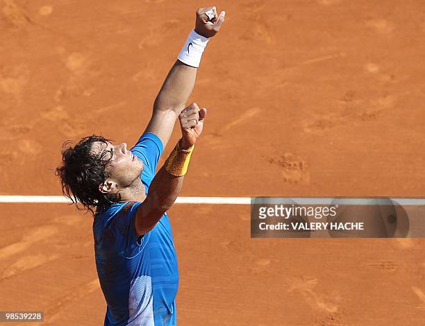 Spanish Rafael Nadal jubilates after winning against his compatriot Fernando Verdasco during the Monte-Carlo ATP Masters Series final tennis...