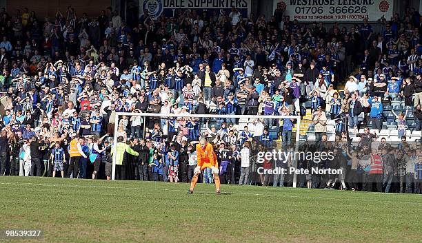 Frank Fielding of Rochdale looks on as fans wait on the touchline for the final whistle to celebrate Rochdale's first promotion in 41 years at the...