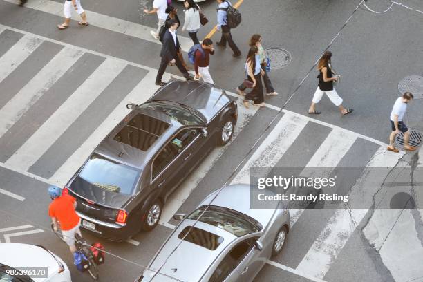 June 21: Pedestrians, cyclists and motorists all trying to navigate the complicated and confusing intersection of Bay Street and Richmond Street West.