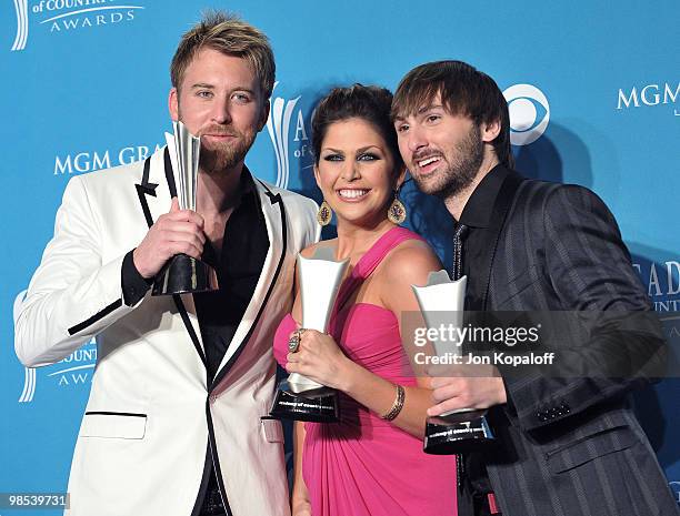 Charles Kelley, Hillary Scott and Dave Haywood of Lady Antebellum pose at the 45th Annual Academy Of Country Music Awards - Press Room at the MGM...
