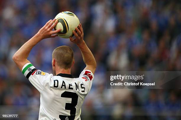 Filip Daems of Gladbach does a throw-in during the Bundesliga match between FC Schalke 04 and Borussia Moenchengladbach at the Veltins Arena on March...