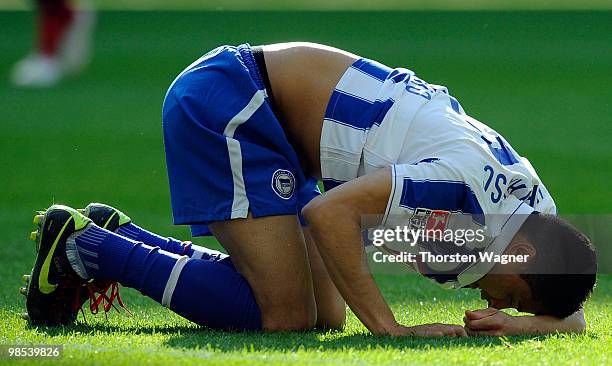 Cicero of Berlin is lying on the pitch during the Bundesliga match between Eintracht Frankfurt and Hertha BSC Berlin at Commerzbank Arena on April 18...