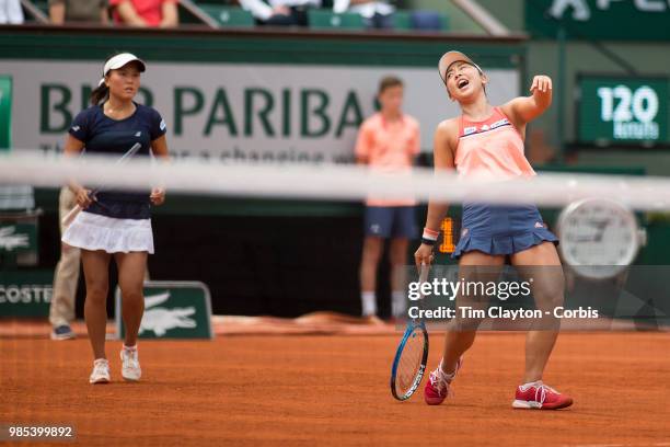 June 10. French Open Tennis Tournament - Day Fifteen. Eri Hozumi of Japan in action with her doubles partner Makoto Ninomiya of Japan against Barbora...