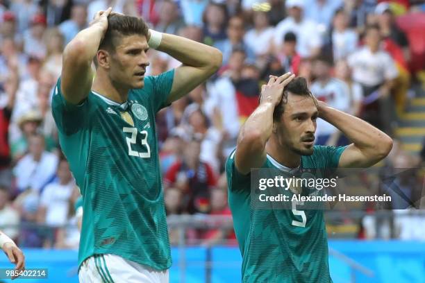 Mats Hummels of Germany and his team mate Mario Gomez react during the 2018 FIFA World Cup Russia group F match between Korea Republic and Germany at...