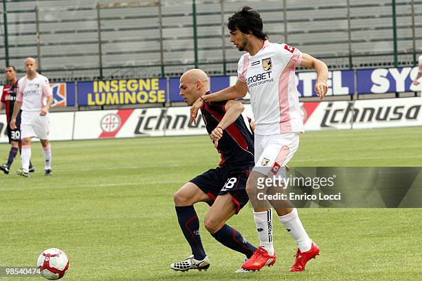 AndreaParola of Cagliari and Pastore Javier Matias of Palermo during the Serie A match between Cagliari Calcio and US Citta di Palermo at Stadio...