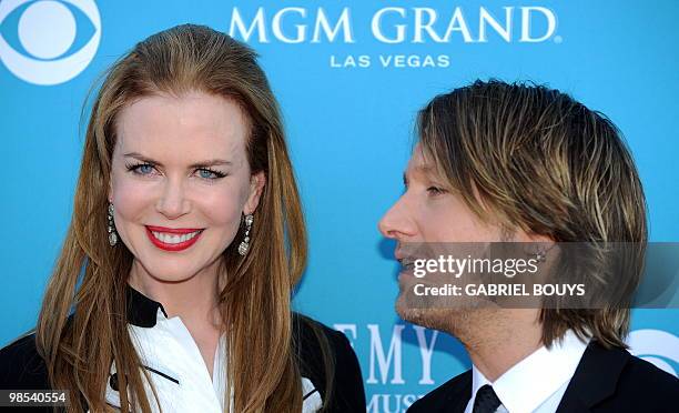 Singer Keith Urban arrives with his wife, actress Nicole Kidman at the 45th Academy of Country Music Awards in Las Vegas, Nevada, on April 18, 2010....