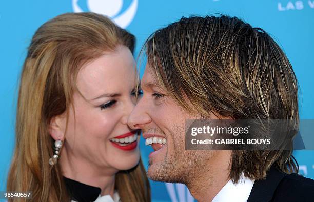 Singer Keith Urban arrives with his wife, actress Nicole Kidman at the 45th Academy of Country Music Awards in Las Vegas, Nevada, on April 18, 2010....