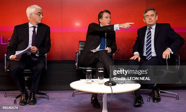 British Business Secretary Peter Mandelson, Chancellor of the Exchequer Alistair Darling and Prime Minister Gordon Brown speak to members of the...