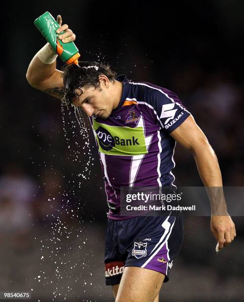 Billy Slater of the Storm cools down during the round six NRL match between the Melbourne Storm and the Manly Sea Eagles at Etihad Stadium on April...