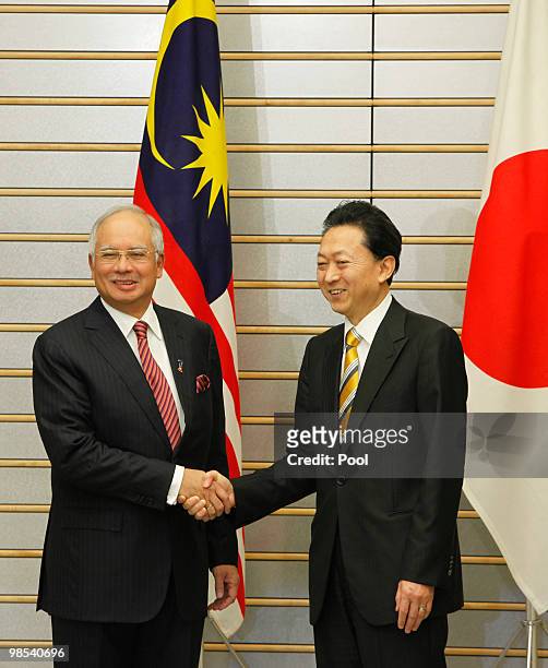 Japanese Prime Minister Yukio Hatoyama welcomes Prime Minister of Malaysia Najib Tun Razak at the premier's official residence on April 19, 2010 in...