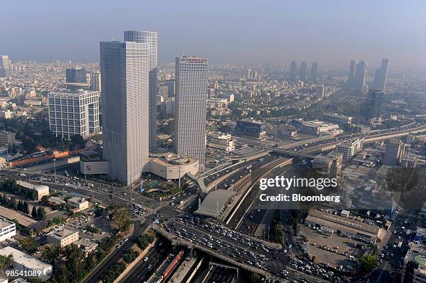 Traffic passes the towers of the Azrieli Center, left, in Tel Aviv, Israel, on Sunday, April 18, 2010. Azrieli Group, billionaire David Azrieli's...