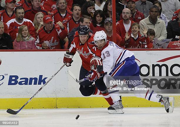 Michael Cammalleri of the Montreal Canadiens checks Jason Chimera of the Washington Capitals in Game Two of the Eastern Conference Quarterfinals...