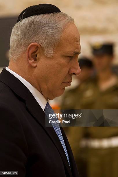 Israel's Prime Minister Benjamin Netanyahu attends a ceremony for fallen soldiers during the annual Memorial Day at the Mt. Herzl military cemetery...