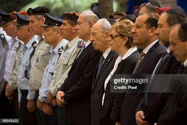 Israel's Prime Minister Benjamin Netanyahu and Israeli President Shimon Peres attend a ceremony for fallen soldiers during the annual Memorial Day at...