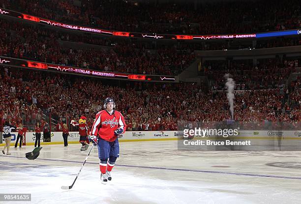 Nicklas Backstrom of the Washington Capitals is saluted by the fans following his hat trick against the Montreal Canadiens in Game Two of the Eastern...