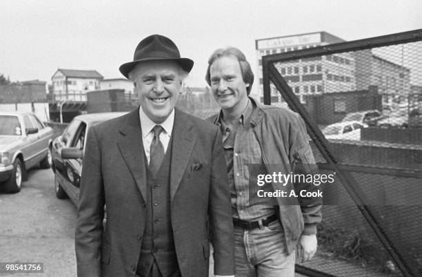 George Cole pictured as Arthur Daley with Dennis Waterman as Terry McCann, in a scene from the ITV drama Minder, 26th May 1988.