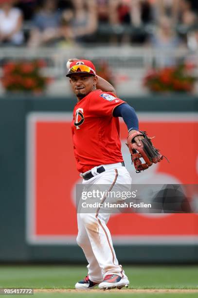 Eduardo Escobar of the Minnesota Twins makes a play at third base against the Texas Rangers during the game on June 24, 2018 at Target Field in...