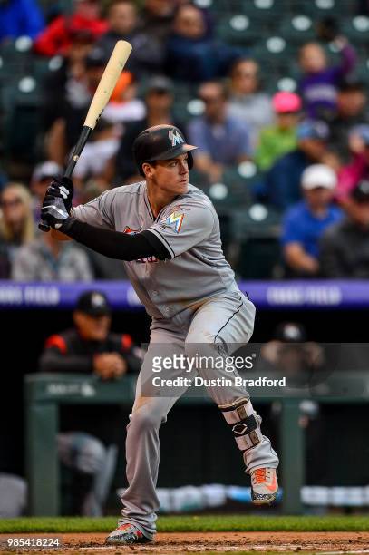 Brian Anderson of the Miami Marlins bats against the Colorado Rockies during a game at Coors Field on June 24, 2018 in Denver, Colorado.