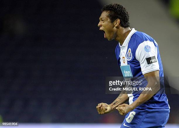 Porto´s midfielder from Colombia Fredy Guarin celebrates after scoring against Vitoria SC during their Portuguese first league football match at the...