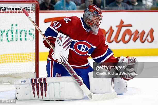 Jaroslav Halak of the Montreal Canadiens makes a glove save on the puck during the NHL game against the Ottawa Senators on March 22, 2010 at the Bell...