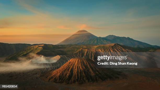mount bromo at sunset in indonesia. - surabaya stock pictures, royalty-free photos & images