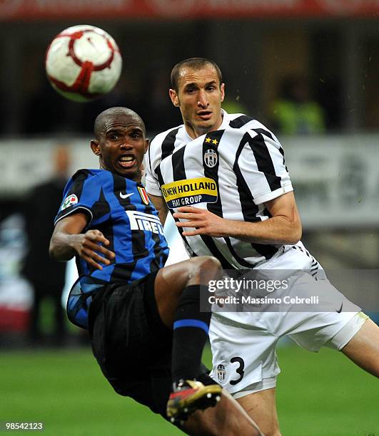 Samuel Eto'o Fils of FC Internazionale Milano battles for the ball against Giorgio Chiellini of Juventus FC during the Serie A match between FC...