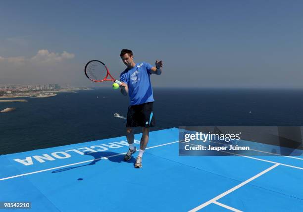 Robin Soderling of Sweden returns a ball to Fernando Verdasco of Spain during a promotional event on day one the ATP 500 World Tour Barcelona Open...