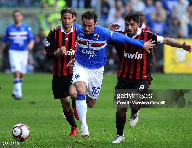 Giampaolo Pazzini of UC Sampdoria battles fot the ball against Gennaro Gattuso of AC Milan during the Serie A match between UC Sampdoria and AC Milan...