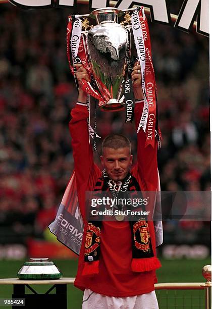 David Beckham with the FA Carling Premiership trophy aftre the FA Carling Premiership match between Manchester United and Derby County at Old...