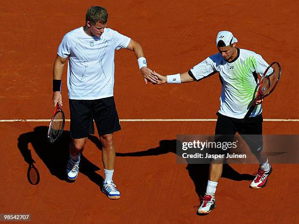 Mark Knowles of the Bahamas celebrates a point with his doubles partner Lleyton Hewitt of Austrialia during their ATP 500 World Tour Barcelona Open...