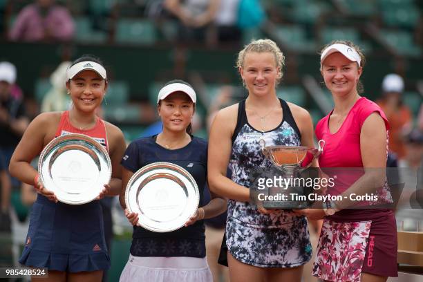 June 10. French Open Tennis Tournament - Day Fifteen. Barbora Krejcikova, and Katerina Siniakova of the Czech Republic with the winners trophy after...