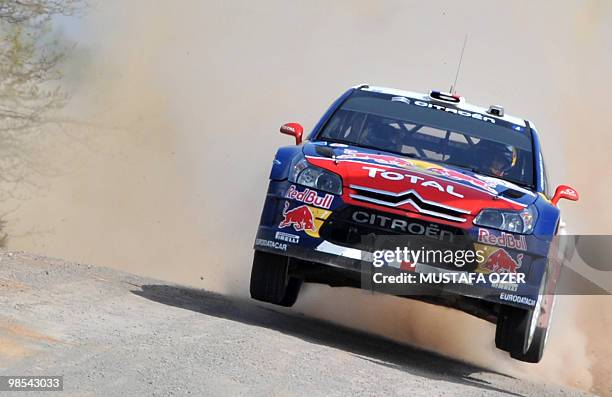 Sebastien Loeb of France and Daniel Elena of Monaco compete in their Citroen C4 Total during the first leg of the WRC Rally of Turkey on April 17,...