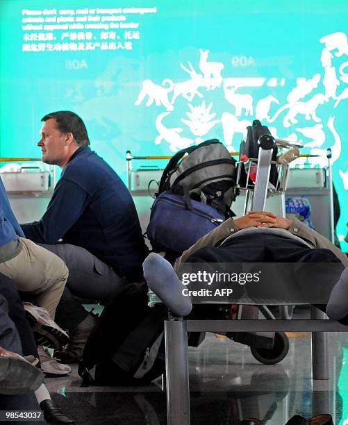 European passengers wait at Beijing Capital International airport after flights from China to Europe were cancelled on April 19, 2010. More than 150...