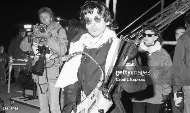 Jean Michel Jarre, musician and producer, pictured holding a musicial instrument, 12th October 1988.