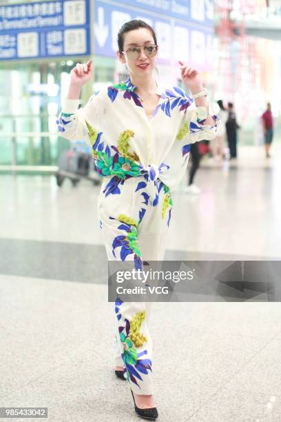 Actress Qin Hailu arrives at Beijing Capital International Airport on June 26, 2018 in Beijing, China.