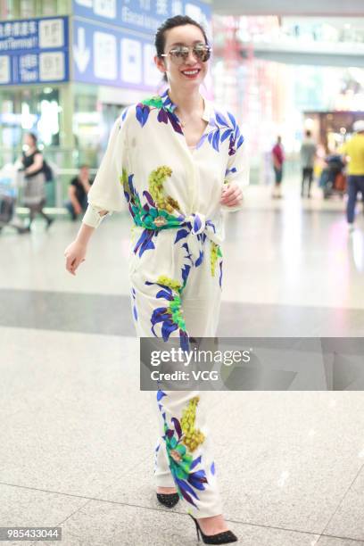 Actress Qin Hailu arrives at Beijing Capital International Airport on June 26, 2018 in Beijing, China.