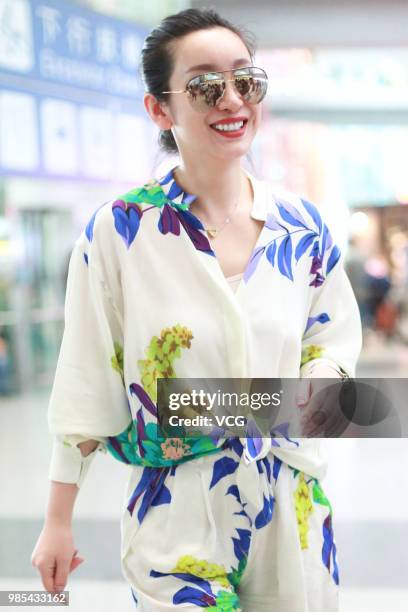 Actress Qin Hailu arrives at Beijing Capital International Airport on June 26, 2018 in Beijing, China.