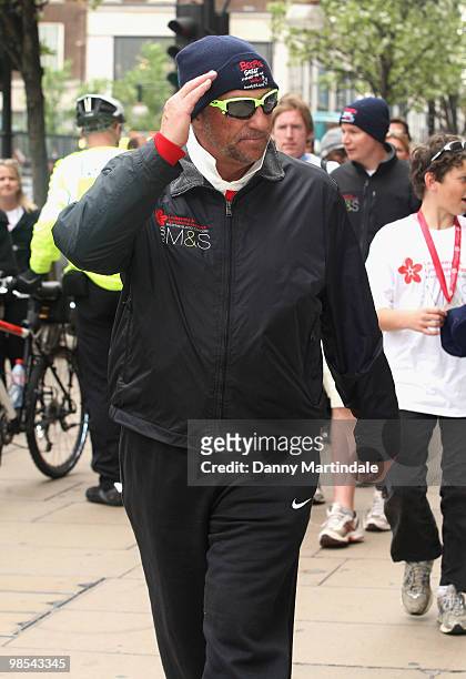 Ian Botham finishes his Beefy's Great Forget-Me-Not walk along Oxford Street at a photocall in aid of Leukaemia Research on April 19, 2010 in London,...