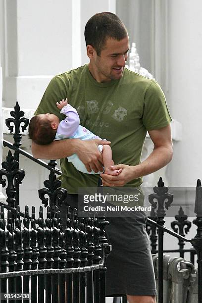 Joe Cole holds his baby daughter Ruby Tatiana on April 19, 2010 in London, England.