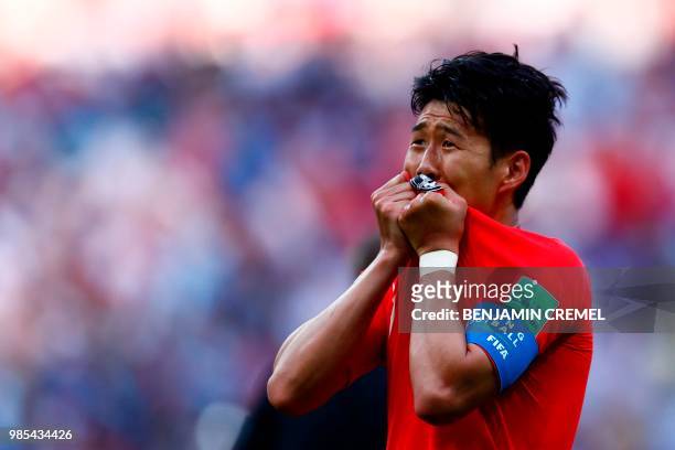 South Korea's forward Son Heung-min celebrates scoring his goal during the Russia 2018 World Cup Group F football match between South Korea and...