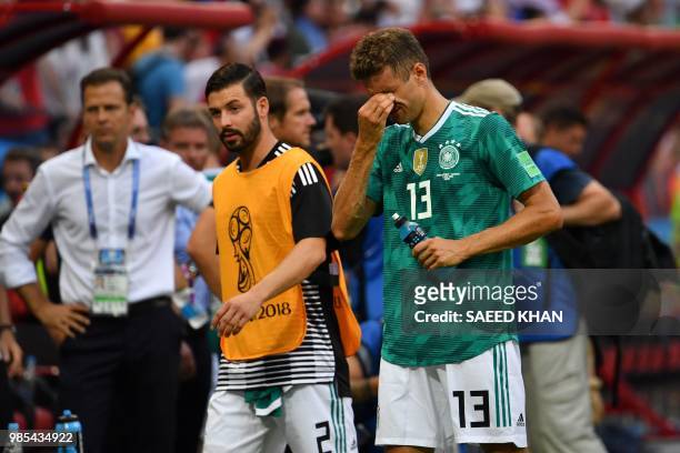 Germany's forward Thomas Mueller reacts at the end of the Russia 2018 World Cup Group F football match between South Korea and Germany at the Kazan...