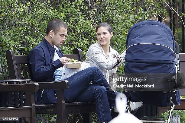 Joe Cole and Carly Cole take a stroll with their baby daughter Ruby Tatiana on April 19, 2010 in London, England.