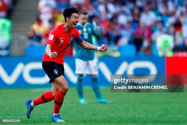 South Korea's forward Son Heung-min celebrates scoring his goal during the Russia 2018 World Cup Group F football match between South Korea and...