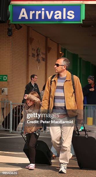 Family arrive at the Dover ferry port from Calais in France on April 19, 2010 in Dover, England. Thousands of UK passengers are unable to return home...