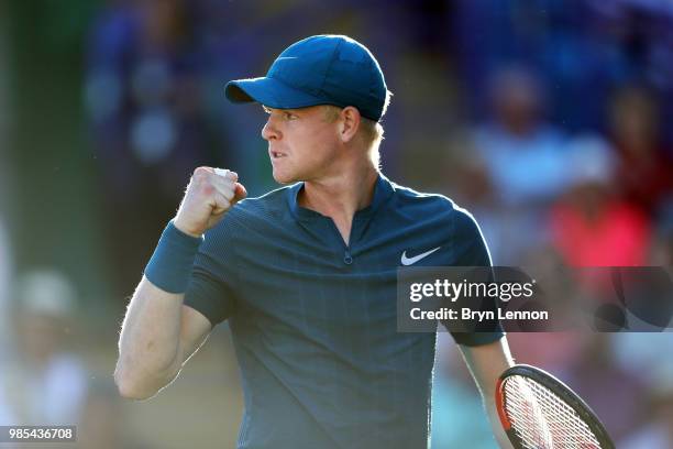 Kyle Edmund of Great Britain celebrates during his match against Andy Murray of Great Britain on day six of the Nature Valley International at...