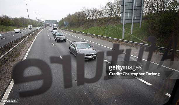 The cavalcade of British Prime Minister Gordon Brown makes its way along the motorway as it follows the Labour party campaign battle bus on April 19,...